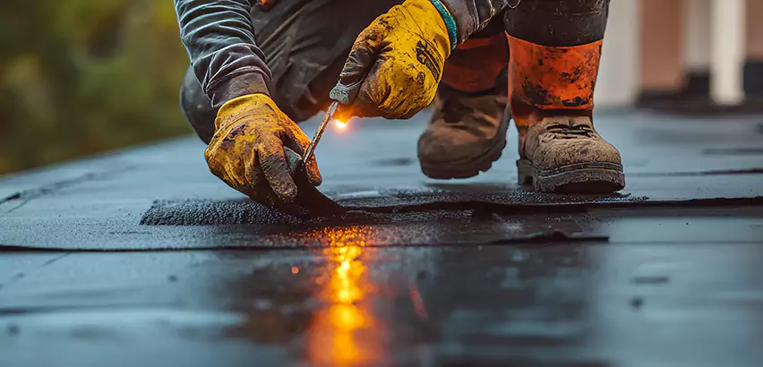 EPDM Roof Repair Tape Application in McHenry